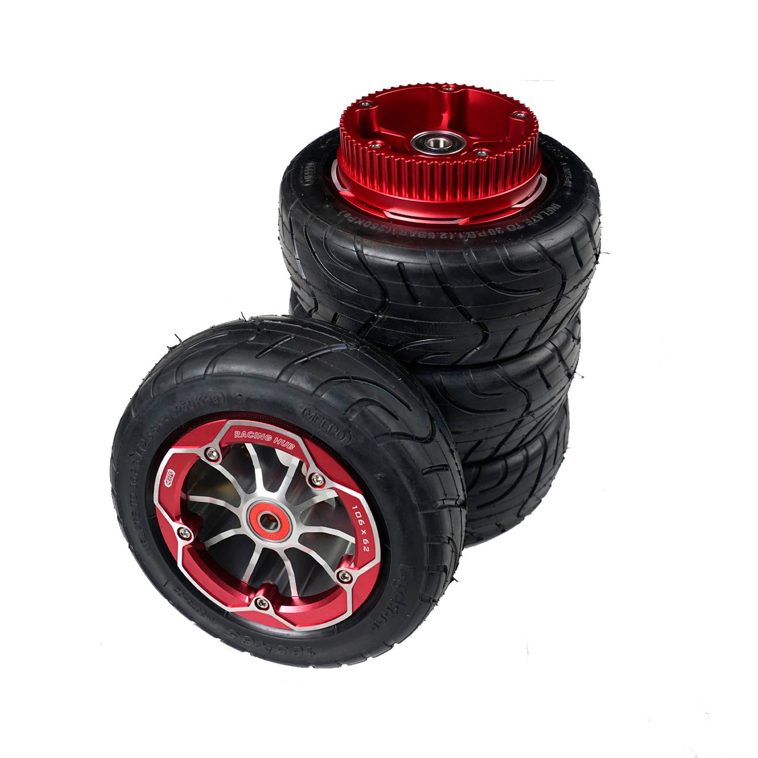 High-performance racing wheels with red rims stacked for electric skateboards.