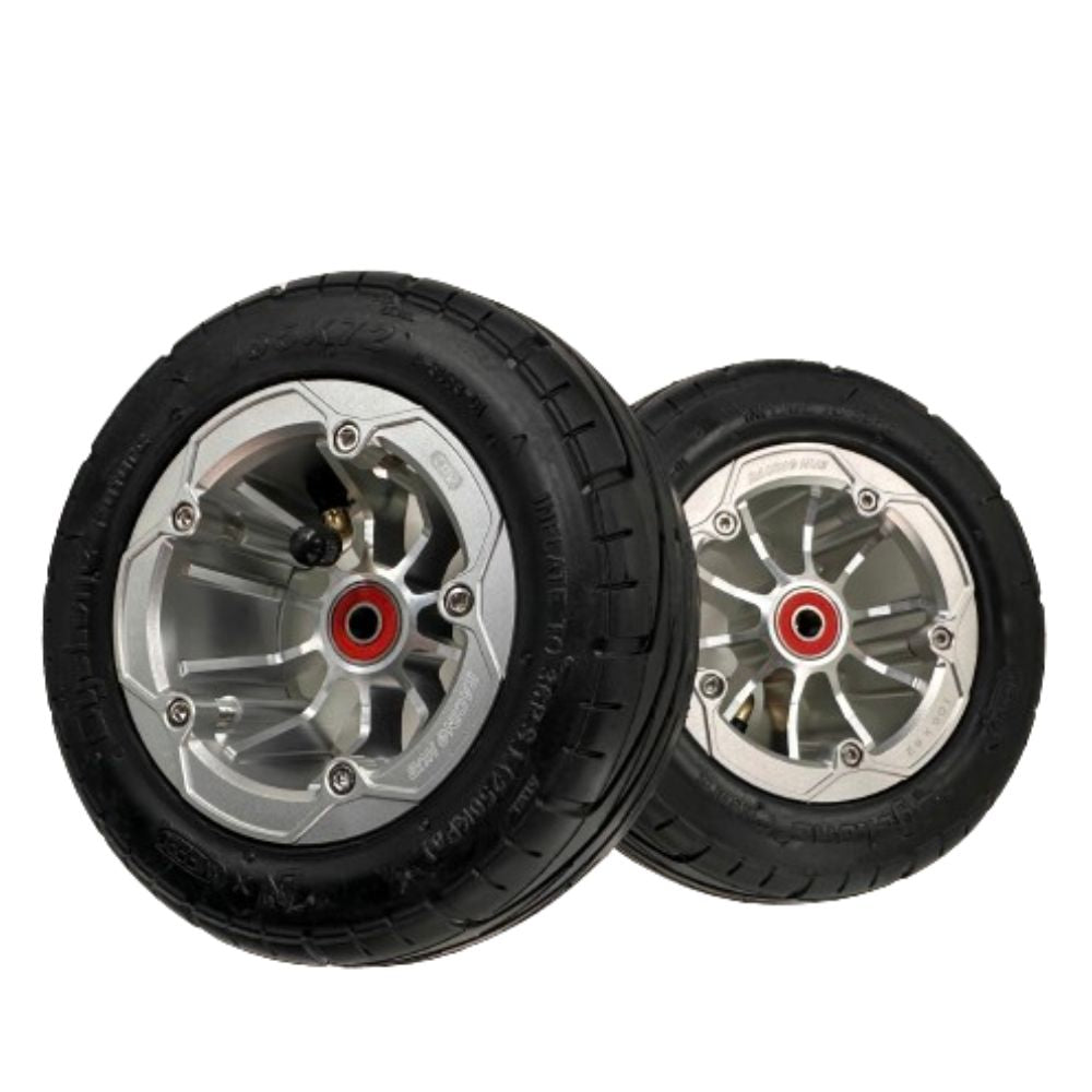 Cyclone 165s tubeless tires and wheels for electric skateboards, designed for performance.