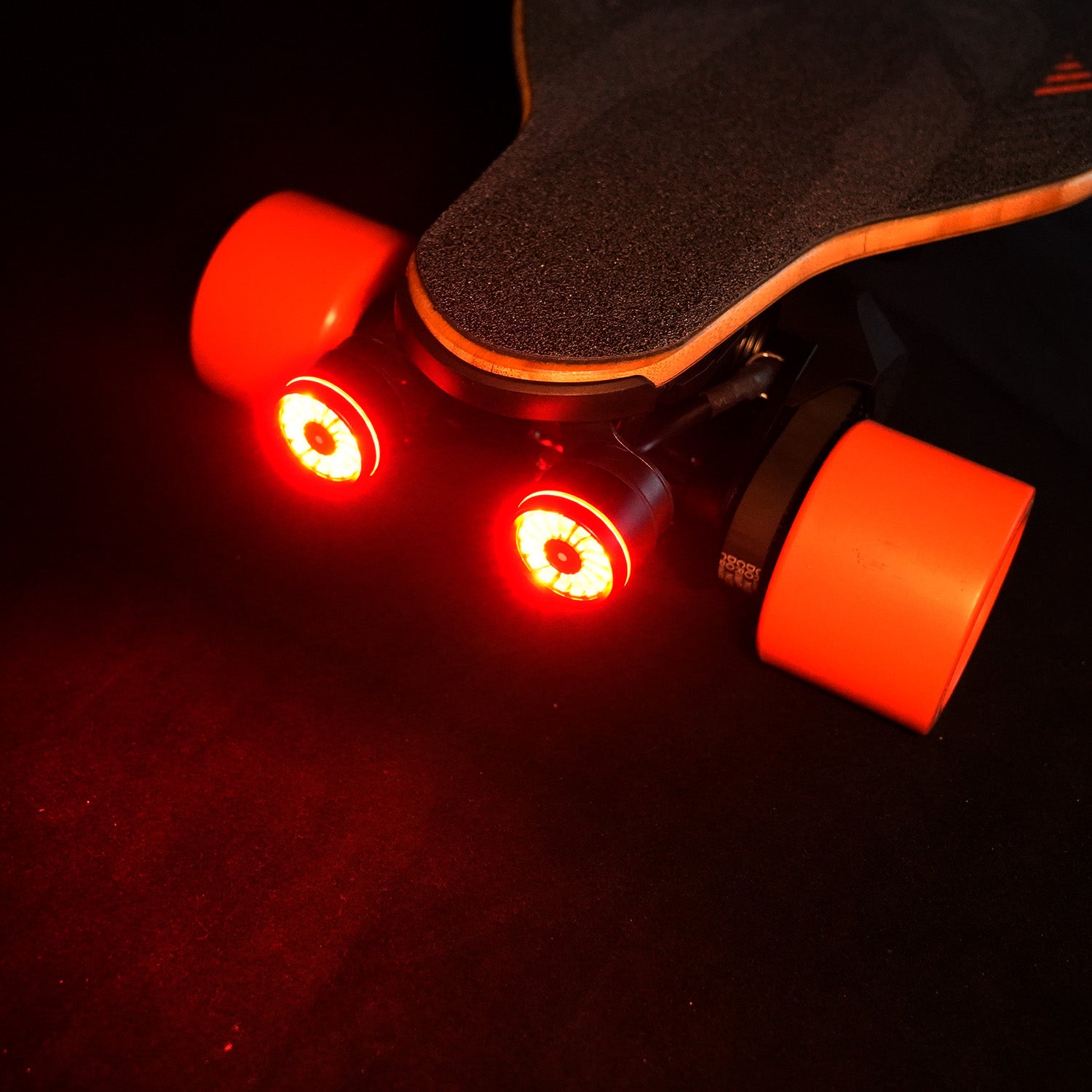 Red LED tail lights on Meepo electric skateboard for improved nighttime safety