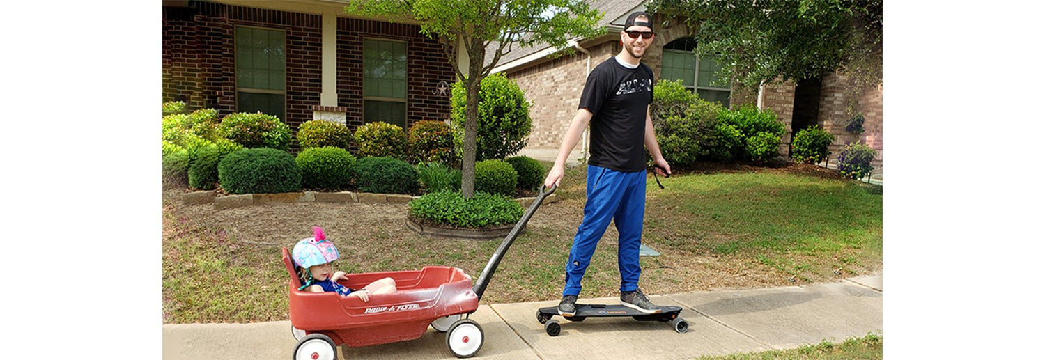 Tyler with his daughter on his meepo board