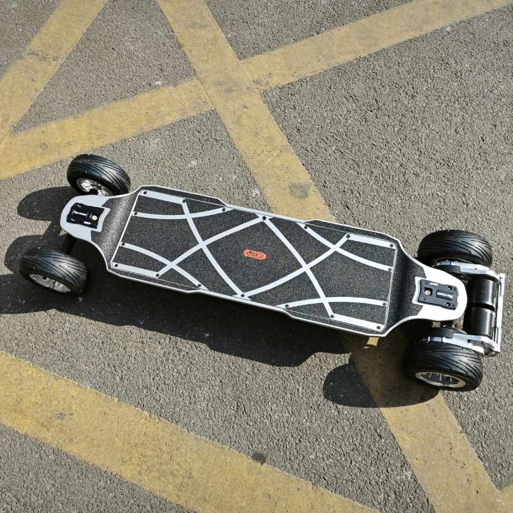 Overhead view of Meepo Vader electric skateboard showcasing carbon fiber deck and wheels.