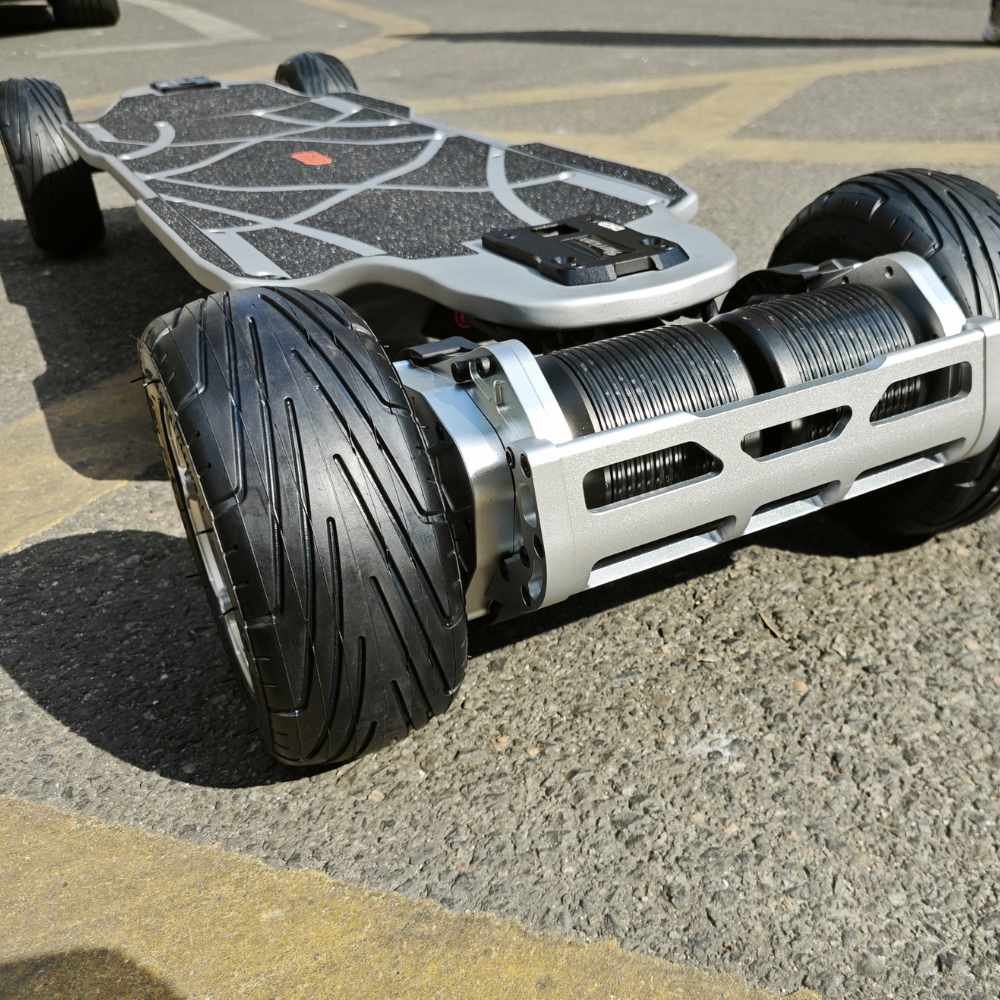Close-up of Meepo Vader electric skateboard's unique tire design and dual motor system.