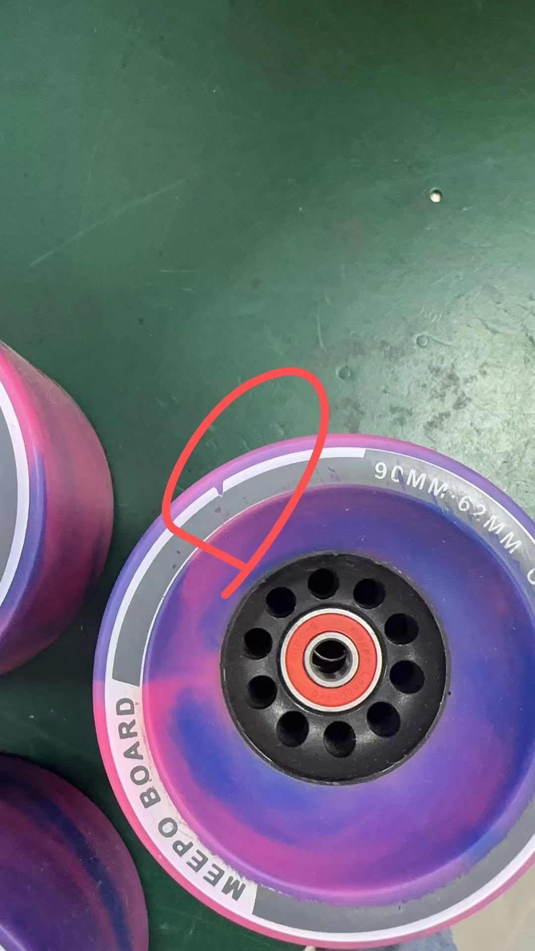 Set of two purple Meepo skateboard front wheels with black bearings