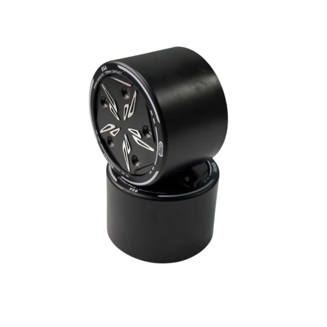 Pair of black 90mm PU sleeves for electric skateboards with 83A hardness