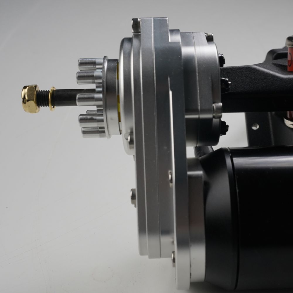 Close-up of Meepo skateboard gear drive system motor and gearbox assembly.