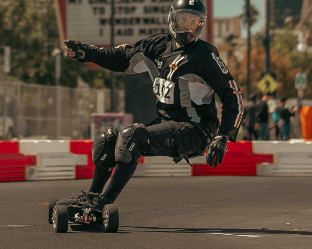 Rider practicing agility on Meepo Monsoon Legacy Raceboard during a race.