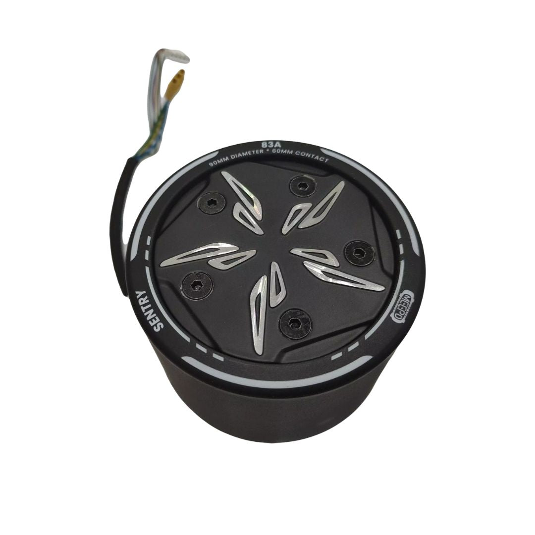 Black electric skateboard motor with wires and six bolt holes