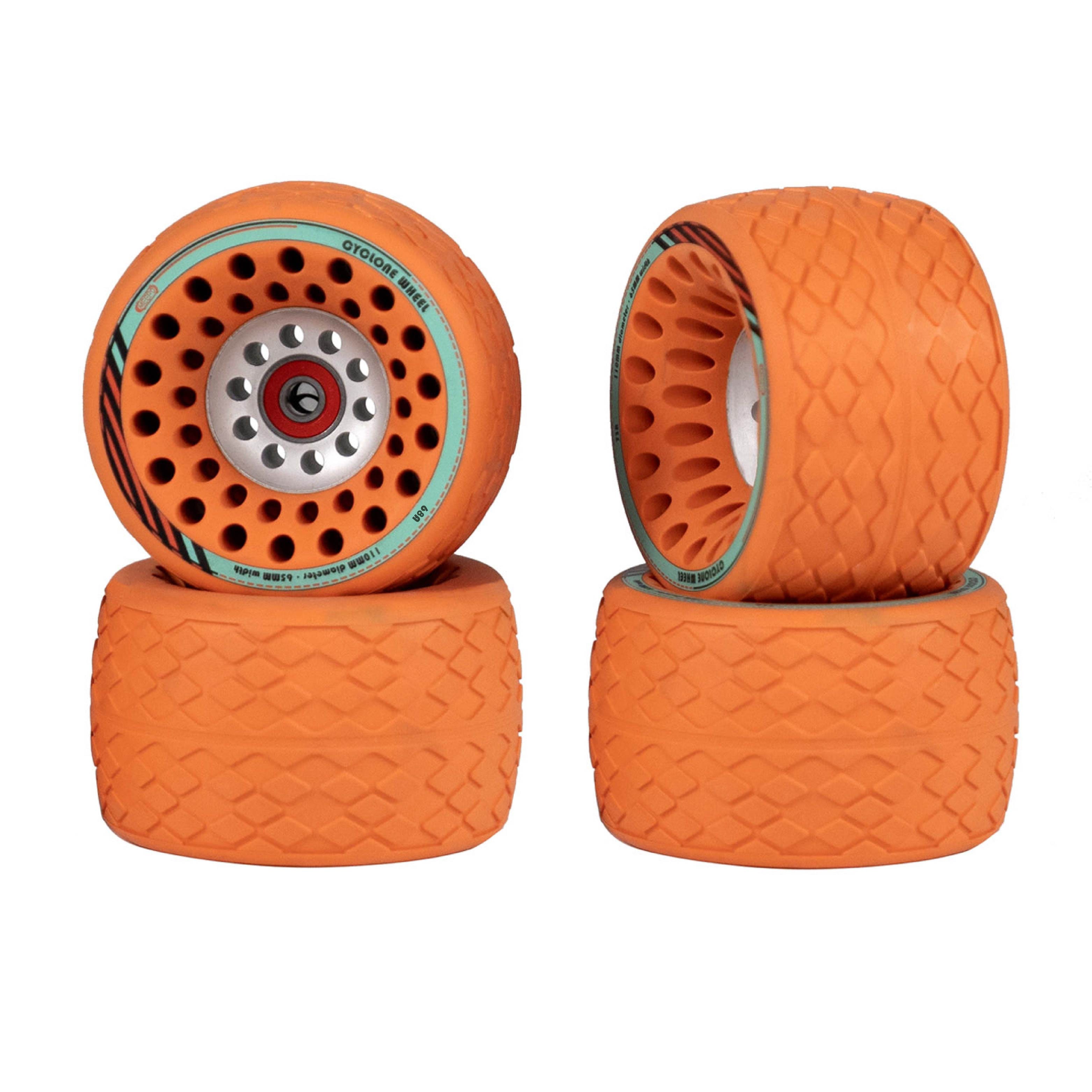 Vibrant orange Meepo Cyclone 110s wheels with unique tread and central bearing.