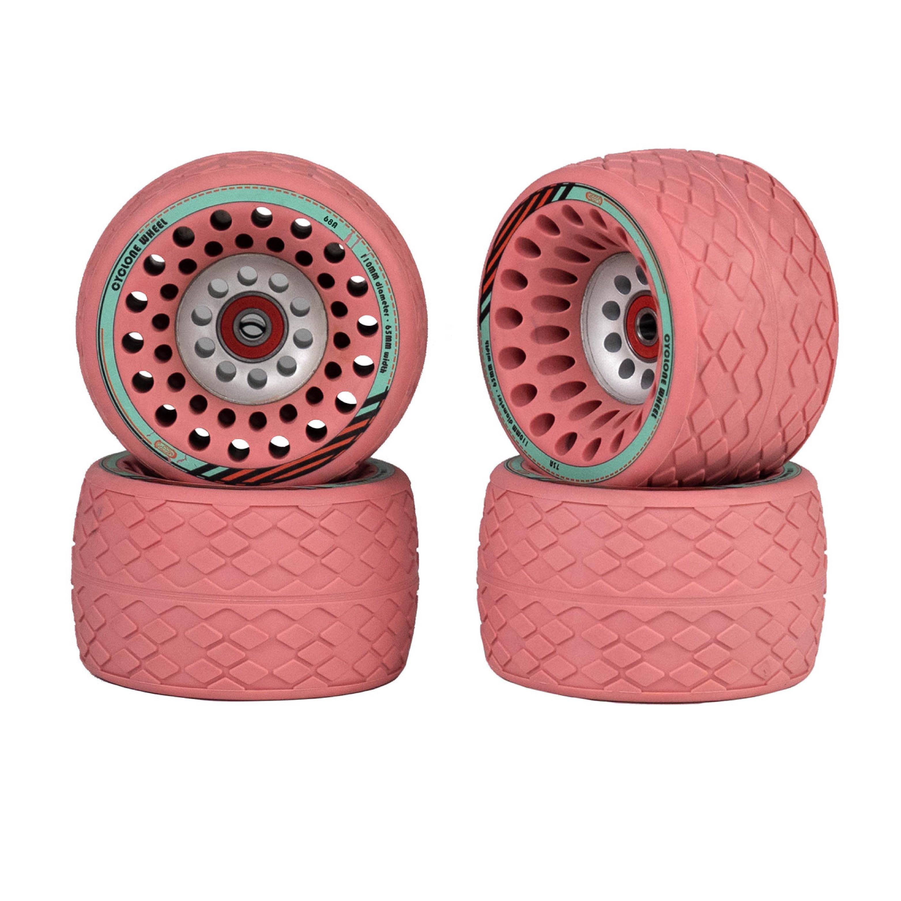 Meepo Cyclone 110s pink wheels with distinctive tread pattern and central bearing for grip.