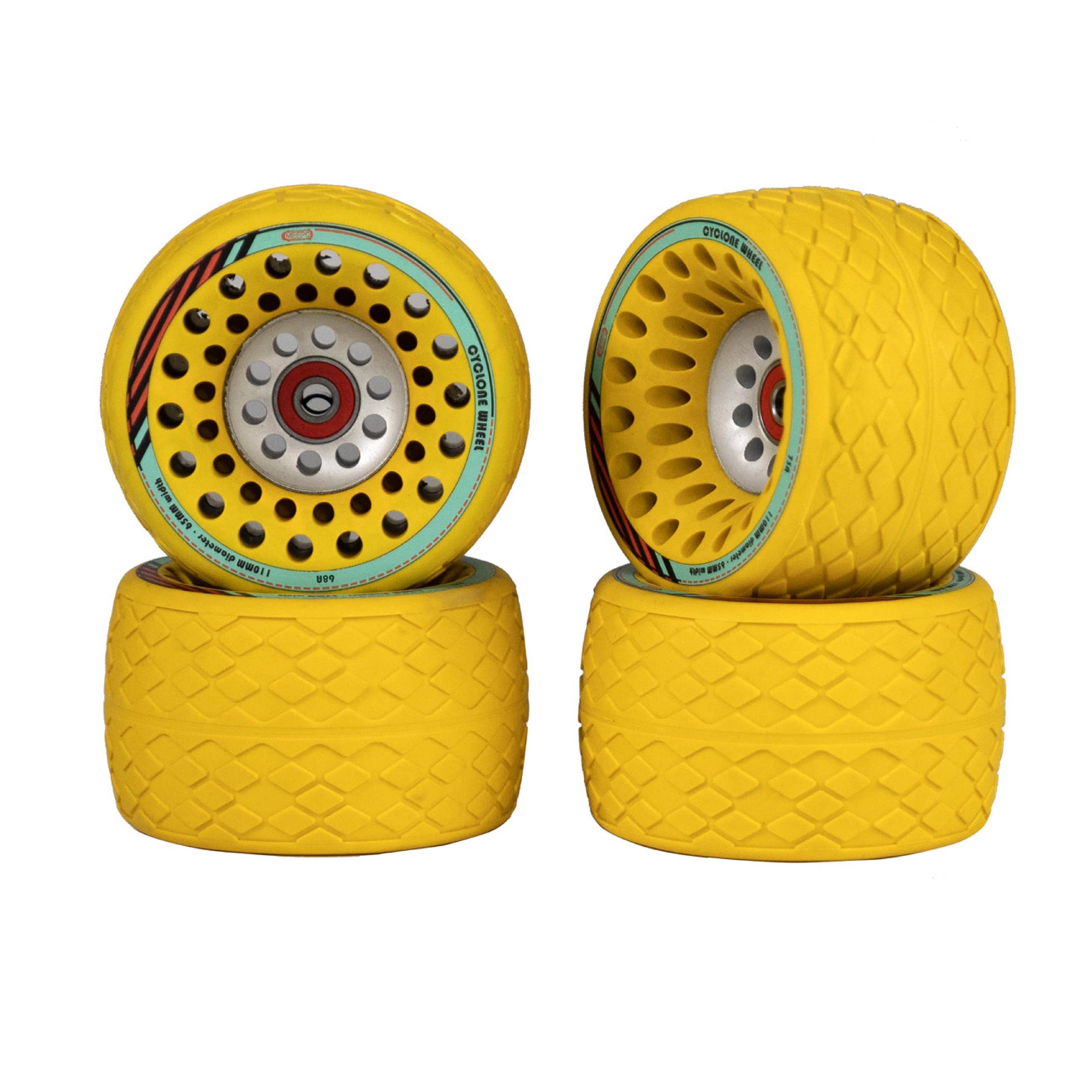 Meepo Cyclone 110s yellow rubber wheels with a distinctive tread pattern for high grip.